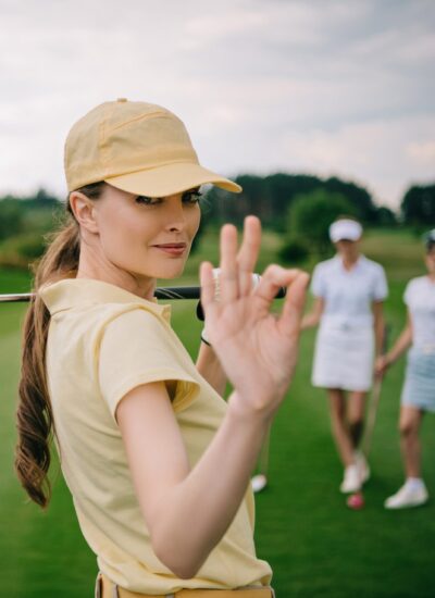 selective-focus-of-female-golf-player-with-golf-cl-2024-11-18-17-27-00-utc (1)